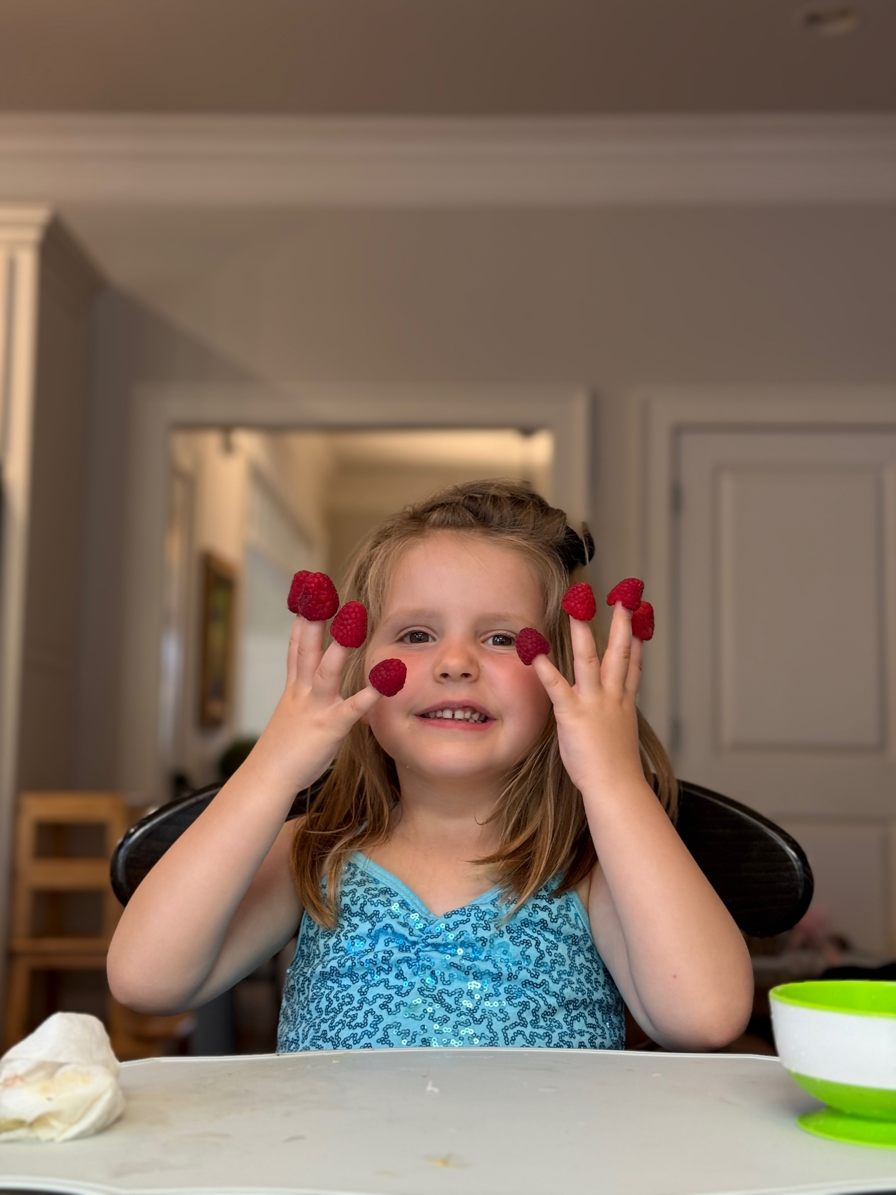 Daughter with raspberries
